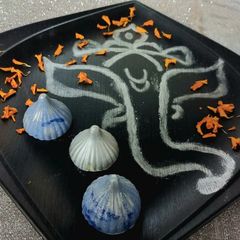 A picture of Blue berry chocolate modak.