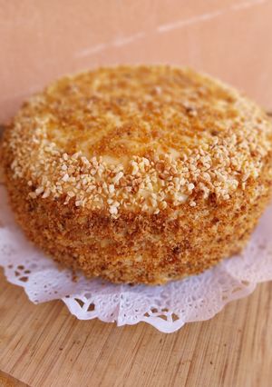 Una foto de Mega tarta de nueces caramelizadas y crema