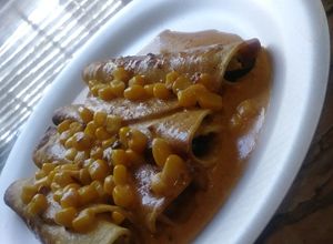 Una foto de Tacos dorados a la poblana