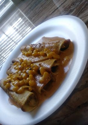 Una foto de Tacos dorados a la poblana