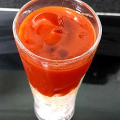 A picture of My Iced Tomato Juice with a splash of Worcester Sauce.
