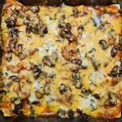 A picture of Enchiladas (and Mexican Hot Sauce).