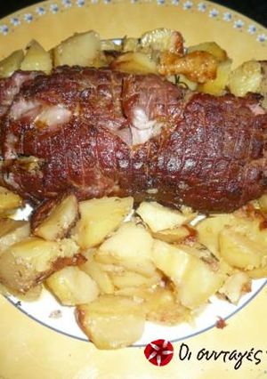A picture of Pork roast with rosemary and beer.
