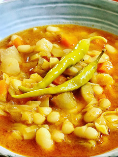 Una foto de Potaje de Alubias blancas con verduras