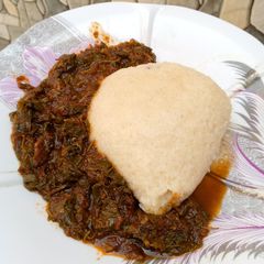 Spinach stew with tuwon semovita A picture of Spinach stew with tuwon semovita.