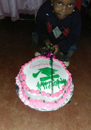 A picture of Graduation cum birthday cake.