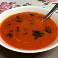A picture of Roasted Capsicum And Tomato Soup.