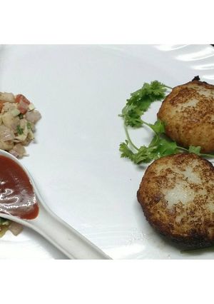 A picture of Stuffed rice croquettes.