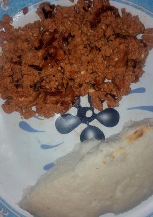 A picture of Ugali with scrambled eggs.
