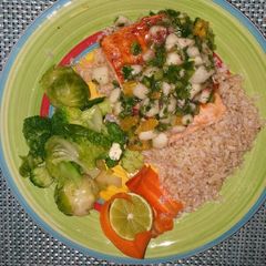 A picture of Grilled salmon with peach citrus salsa.