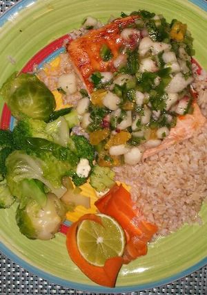A picture of Grilled salmon with peach citrus salsa.