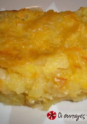 A picture of Patsavouropita with Yogurt and Orange.
