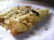 Una foto de panqueques rellenos de chocolate