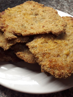 Una foto de Milanesas de cerdo al horno