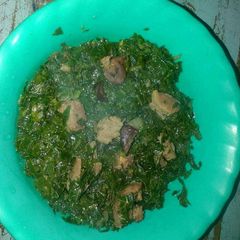 A picture of Fried kales and beef.