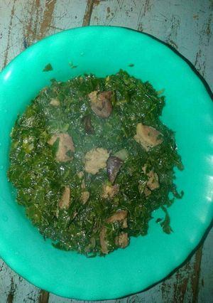 A picture of Fried kales and beef.