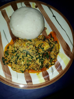 A picture of Pounded yam and egusi soup.