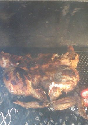 Una foto de Pollo a las brasas con panceta