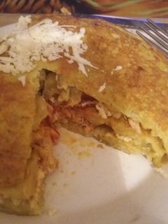 Una foto de Tortipapas con pollo mechado