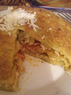 Una foto de Tortipapas con pollo mechado