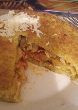 Una foto de Tortipapas con pollo mechado
