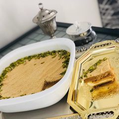 A picture of Toasted Milk Basbousa With Cream.