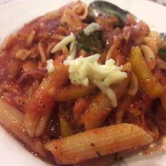 A picture of Cheesy Creamy Pasta in red sauce.