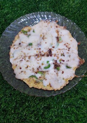 A picture of Cheese omelet pizza.