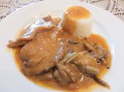 Una foto de bistec de ternera al horno