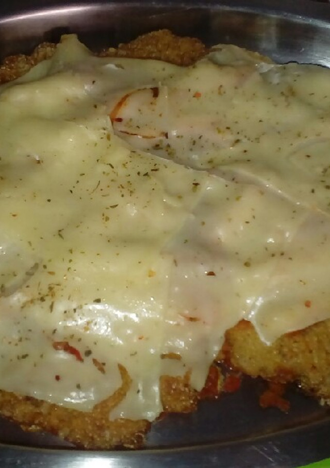 Una foto de Milanesas a la napolitanas