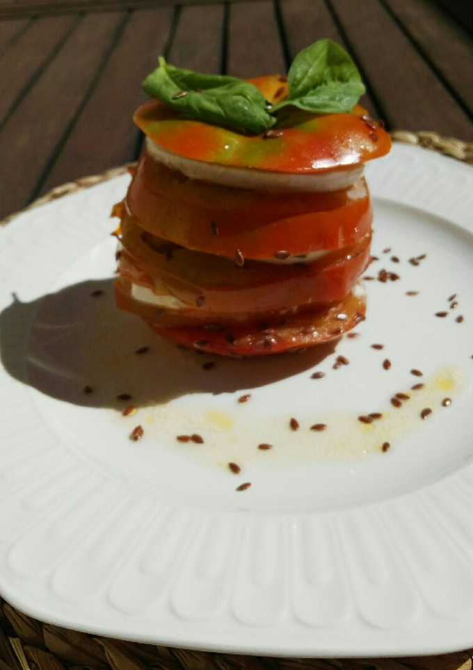 Una foto de Tomate a la plancha con Mozzarella
