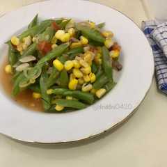 A picture of Tumis buncis jagung simpel.
