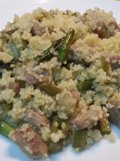 Una foto de Cous cous con presa ibérica