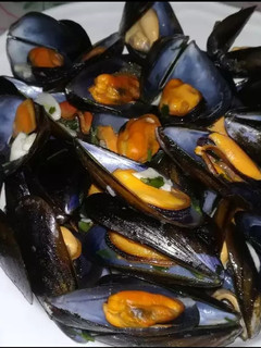 Una foto de Mejillones en salsa verde