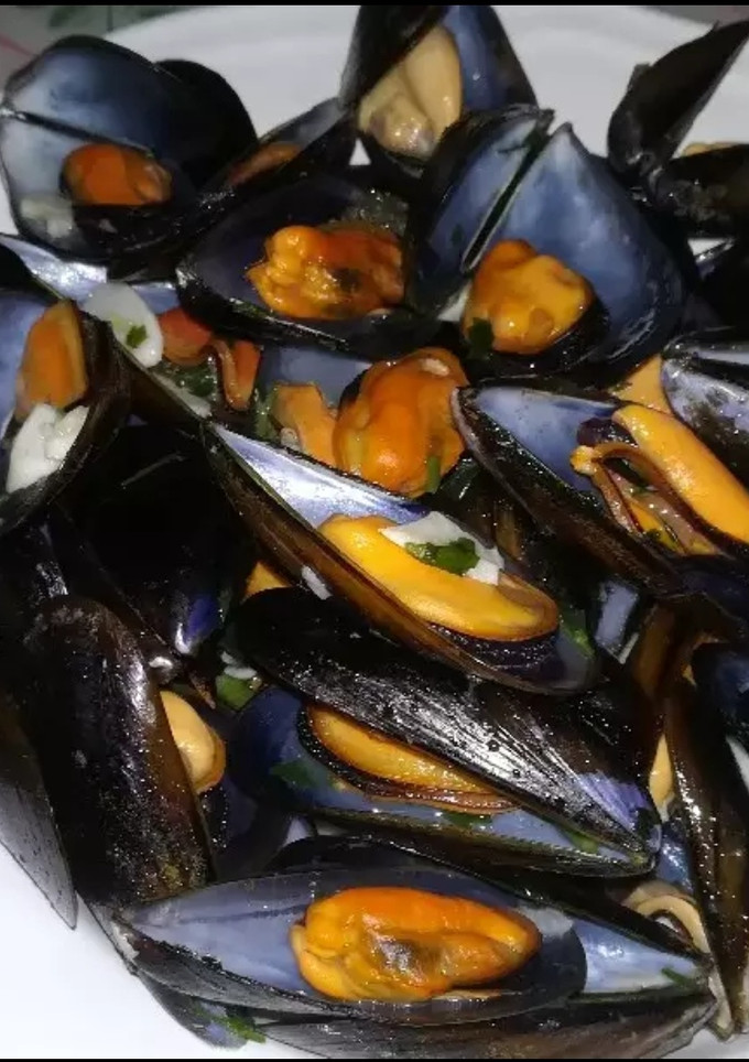 Una foto de Mejillones en salsa verde