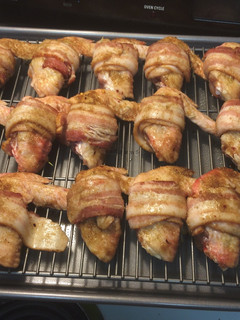 A picture of Chicken wings with bacon.