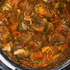 A picture of Chicken vegetable sauce.