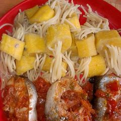 A picture of Spagetti with boiled plantain and fish.