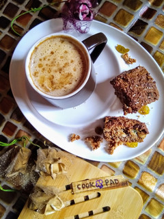 A picture of Oat meal cake with frothy coffee...