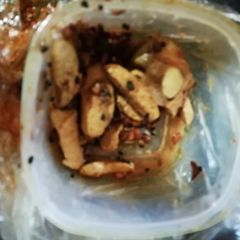 A picture of Achari aloo wedges.