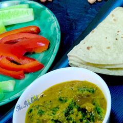 A picture of Bitter gourd in tamarind gravy.