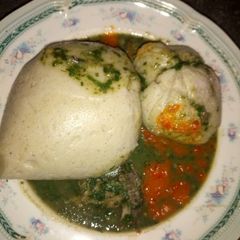 A picture of Ewedu soup with wheat swallow.