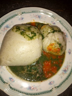 A picture of Ewedu soup with wheat swallow.