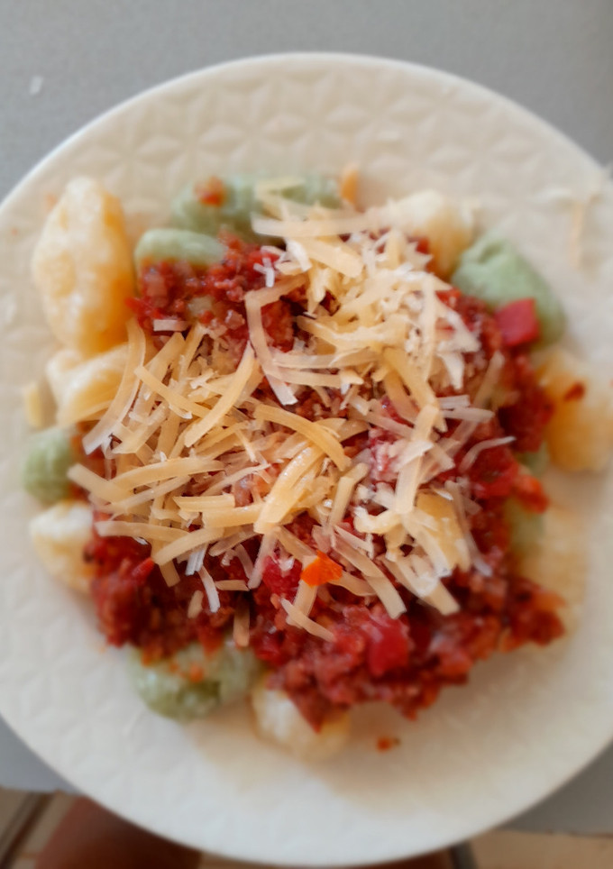 Una foto de Ñoquis de papa con salsa de tomate: