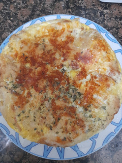 Una foto de Tortilla de pan duro y especias