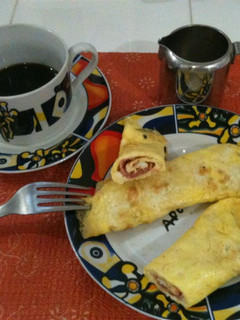 Una foto de Rollitos de tortilla de huevos y jamón