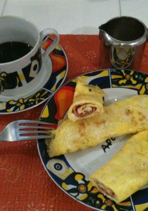 Una foto de Rollitos de tortilla de huevos y jamón
