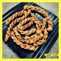 Braided flaky biscuits/ mathri A picture of Braided flaky biscuits/ mathri.
