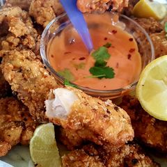 A picture of Coaty oats chicken pieces.