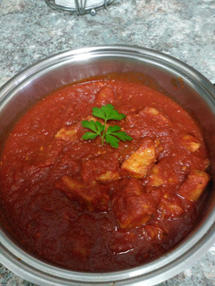 Una foto de Lomo con tomate en olla GM E
